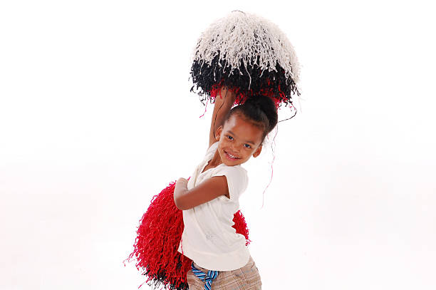 A four year old girl cheering A four year old girl cheering